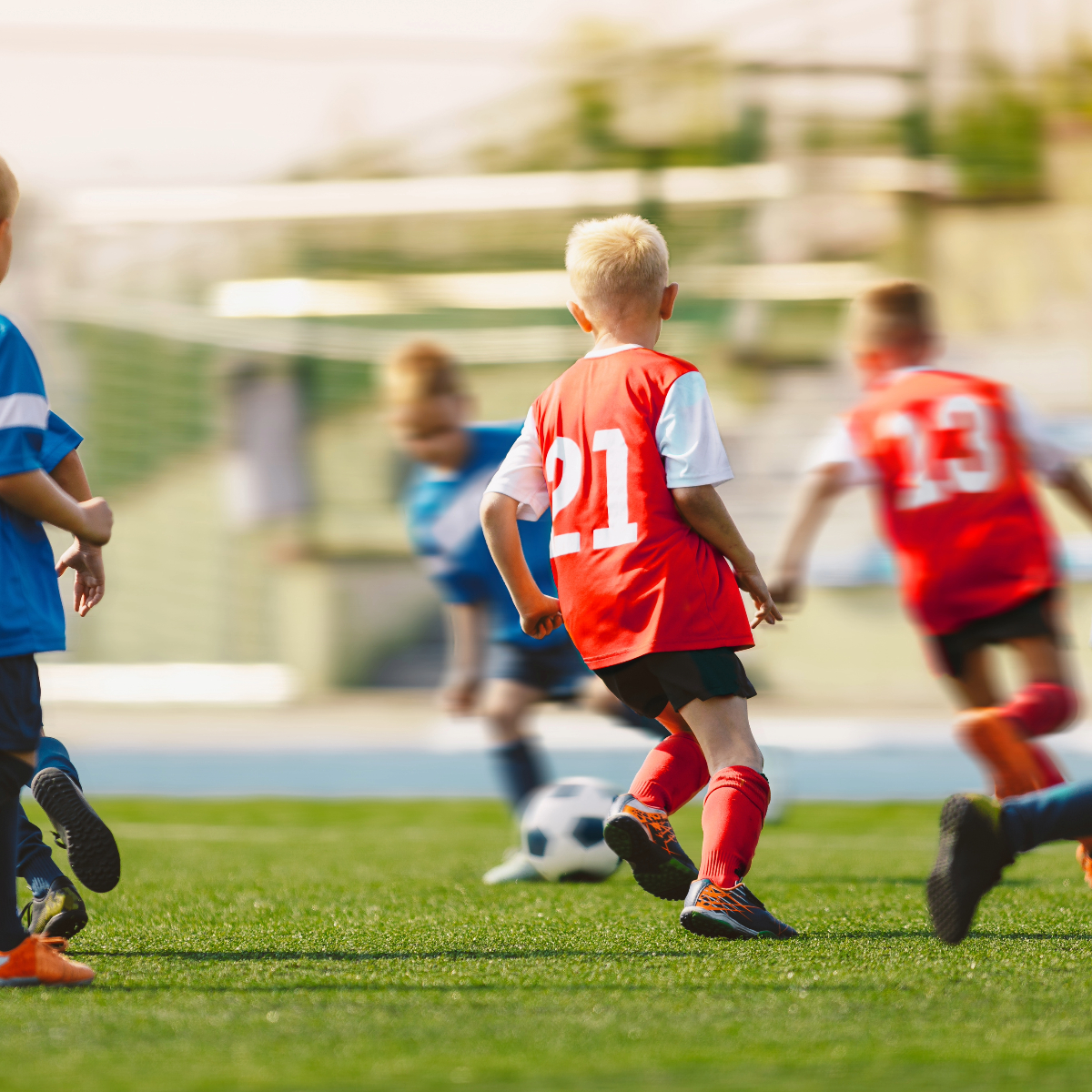 children playing soccer