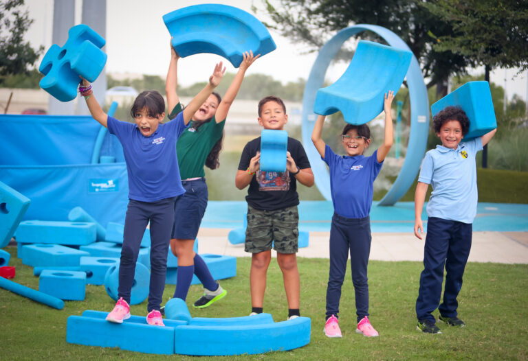 Kids Playing with Big Blue Blocks in Houston, Texas